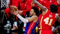 epa11036645 Detroit Pistons guard Cade Cunningham (L) in action against Atlanta Hawks forward Saddiq Bey (R) during the first half of the NBA basketball game between the Detroit Pistons and the Atlanta Hawks in Atlanta, Georgia, USA, 18 December 2023.  EPA/ERIK S. LESSER SHUTTERSTOCK OUT