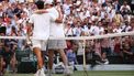 Italy's Jannik Sinner (R) greets Spain's Carlos Alcaraz after winning their men's singles final tennis match on the fourteenth day of the 2025 Wimbledon Championships at The All England Lawn Tennis and Croquet Club in Wimbledon, southwest London, on July 13, 2025. 
HENRY NICHOLLS / AFP