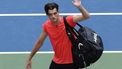 2023-09-05 22:38:59 USA's Taylor Fritz waves after being defeated by Serbia's Novak Djokovic during the US Open tennis tournament men's singles quarter-finals match at the USTA Billie Jean King National Tennis Center in New York City, on September 5, 2023. 
Kena BETANCUR / AFP