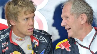 epa02407521 German F1 driver Sebastian Vettel of Red Bull and Red Bull Director Helmut Marko arrive at the paddock for a free practice session 23 October 2010 at the Korea International circuit in Yeongam, south Korea ahead of the first Korean F1 race to be staged 24 Oct.  EPA/DAVID EBENER