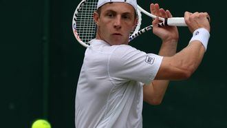 epa11455622 Tallon Griekspoor of the Netherlands in action against Miomir Kecmanovic of Serbia during their Mens Singles 2nd round match at the Wimbledon Championships, Wimbledon, Britain, 03 July 2024.  EPA/TIM IRELAND  EDITORIAL USE ONLY