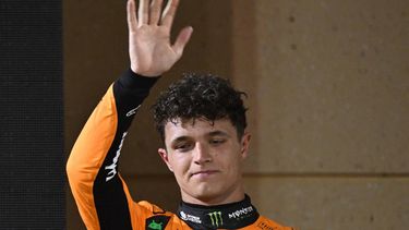 McLaren's British driver Lando Norris stands on the podium after the Bahrain Formula One Grand Prix at the Bahrain International Circuit in Sakhir on April 13, 2025. 
Andrej ISAKOVIC / AFP