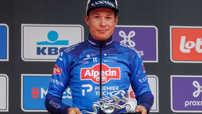 epa12858921 Belgian rider Jasper Philipsen of team Alpecin-Premier Tech poses on the podium after winning the In Flanders Fields - Middelkerke to Wevelgem cycling race in Wevelgem, Belgium, 29 March 2026.  EPA/OLIVIER MATTHYS