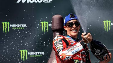 epa13054010 Spanish MotoGP rider Marc Marquez of Ducati Lenovo Team celebrates on podium after winning the the Motorcycling Grand Prix of the Czech Republic at the Masaryk Circuit in Brno, Czech Republic, 21 June 2026.  EPA/MARTIN DIVISEK