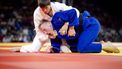 PARIJS - Judoka Frank de Wit in actie tegen Somon Makhmadbekov van Tadzjikistan tijdens de Olympische Spelen. ANP IRIS VAN DEN BROEK