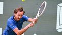 Russia's Daniil Medvedev returns the ball to Germany's Alexander Zverev (not in picture) during the men's singles semi-final match at the Halle Open ATP tennis tournament in Halle, western Germany, on June 21, 2025. 
CARMEN JASPERSEN / AFP