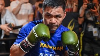 Philippine boxing legend Manny Pacquiao takes part in a training session at a gym in central Tokyo on July 25, 2024, three days ahead of his three-round exhibition boxing match against Japanese mixed martial artist Rukiya Anpo. 
Richard A. Brooks / AFP