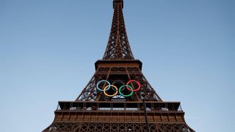 The Olympic rings are seen on the Eiffel Tower on June 7, 2024, ahead the upcoming Paris 2024 Olympic Games. 
Ludovic MARIN / AFP