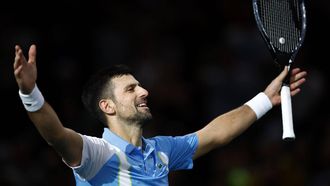 2023-11-04 21:16:11 epa10958270 Novak Djokovic of Serbia celebrates winning his semifinal match against Andrey Rublev of Russia at the Paris Masters tennis tournament in Paris, France, 04 November 2023.  EPA/YOAN VALAT