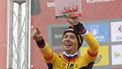 2023-09-13 18:33:01 Team Jumbo's Slovenian rider Primoz Roglic celebrates on the podium after winning the stage 17 of the 2023 La Vuelta cycling tour of Spain, a 124,4 km race between Ribadesella and Alto de l'Angliru on September 13, 2023. 
MIGUEL RIOPA / AFP