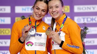 epa11195410 Gold medalist Femke Bol (R) of the Netherlands and silver medalist Lieke Klaver of the Netherlands during the medal ceremony for Women's 400m final at the World Athletics Indoor Championships in Glasgow, Britain, 02 March 2024.  EPA/ADAM VAUGHAN