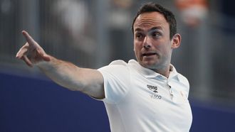 epa11141630 Evangelos Doudesis, head coach of the Netherlands, reacts during the Women's Water Polo match between the Netherlands and China at the FINA World Aquatics Championships in Doha, Qatar, 10 February 2024.  EPA/YURI KOCHETKOV