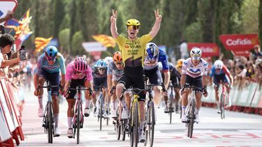 Team Visma-Lease a bike's British rider Matthew Brennan celebrates as he crosses the finish line to win the fifth stage of the Vuelta a Espana 2026, a 173,4 km race between Falset and Roquetes on August 26, 2026.   
Josep LAGO / AFP