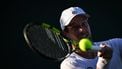 Netherlands' Botic Van De Zandschulp returns the ball to Italy's Matteo Arnaldi during their men's singles first round tennis match on the first day of the 2025 Wimbledon Championships at The All England Lawn Tennis and Croquet Club in Wimbledon, southwest London, on June 30, 2025. 
Kirill KUDRYAVTSEV / AFP