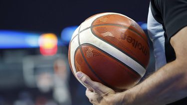 epa12333472 A referee holds the basketball ball during the EuroBasket 2025 group phase basketball match between Turkiye and Czech Republic, in Riga, Latvia, 29 August 2025.  EPA/TOMS KALNINS