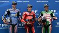 (L to R) BK8 Gresini Racing MotoGP's Spanish rider Alex Marquez, Ducati Lenovo's Spanish rider Marc Marquez, and LCR Honda's French rider Johann Zarco celebrate their second, first, and third place respectively in the MotoGP Argentina Grand Prix qualifying session at the Termas de Rio Hondo circuit in Santiago del Estero, Argentina on March 15, 2025. 
Luis ROBAYO / AFP