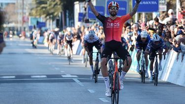 epa11908066 Italian cyclist Filippo Ganna of the Ineos team crosses the finish line in Lagos, Portugal, 19 February 2025. The Commissioners' College of the 51st Volta ao Algarve cancelled the first stage of the race on 19 February after a problem that split the peloton, leading dozens of cyclists to miss the finish line.  EPA/LUIS FORRA