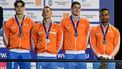 Third placed, Netherlands' team Jess Puts, Sean Niewold, Brandon Van Den Berg and Thom De Boer celebrate on the podium after the Men's 4x50m Medley Relay final competition of the European Short Course Swimming Championships in Otopeni, Bucharest, on December 6, 2023. 
Daniel MIHAILESCU / AFP