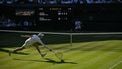 Italy's Jannik Sinner misses his return to Serbia's Novak Djokovic during their men's singles semi-final tennis match on the twelfth day of the 2025 Wimbledon Championships at The All England Lawn Tennis and Croquet Club in Wimbledon, southwest London, on July 11, 2025. 
Glyn KIRK / AFP