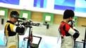 epa11498610 Yuting Huang (R) and Lihao Zheng of China during the 10m Air Rifle Mixed Team qualification of the shooting competitions in the Paris 2024 Olympic Games at the Shooting centre in Chateauroux, France, 27 July 2024  EPA/VASSIL DONEV
