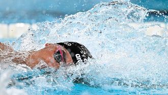 Netherlands' Sean Niewold competes in  the final of the mixed 4x100m freestyle relay swimming event during the LEN European Aquatics Championships at the Olympic Aquatic Centre in Saint-Denis, northern suburbs of Paris, on August 14, 2026. 
JULIEN DE ROSA / AFP