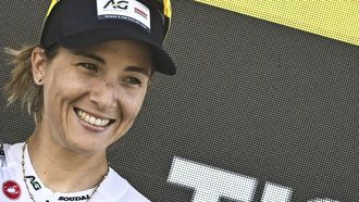 AG Insurance - Soudal Team's Mauritius rider Kimberley Le Court Pienaar celebrates on the podium after winning the 5th stage (out of 9) of the fourth edition of the Women's Tour de France cycling race, 165.8 km from Chasseneuil-du-Poitou to Gueret, in Gueret, central France on July 30, 2025. 
JULIEN DE ROSA / AFP