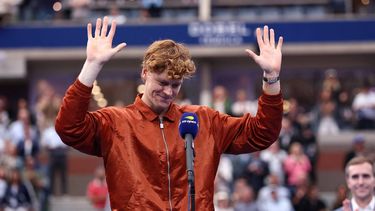 Italy's Jannik Sinner speaks after being defeated by Spain's Carlos Alcaraz in the men's singles final tennis match on day fifteen of the US Open tennis tournament at the USTA Billie Jean King National Tennis Center in New York City on September 7, 2025. 
CHARLY TRIBALLEAU / AFP