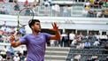 Spain's Carlos Alcaraz returns to Russia's Karen Khachanov during their men's singles match at the ATP Rome Open tennis tournament at Foro Italico in Rome on May 13, 2025. 
PIERO CRUCIATTI / AFP