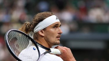 Germany's Alexander Zverev reacts as he plays against US player Taylor Fritz during their men's singles tennis match on the eighth day of the 2024 Wimbledon Championships at The All England Lawn Tennis and Croquet Club in Wimbledon, southwest London, on July 8, 2024. 
HENRY NICHOLLS / AFP