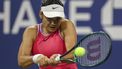 epa11568015 Emma Raducanu of Great Britain returns the ball in the first round match against Sofia Kenin of the United States (unseen) during the US Open Tennis Championships at the USTA Billie Jean King National Tennis Center in Flushing Meadows, New York, USA, 27 August 2024. The US Open tournament runs from 26 August through 08 September.  EPA/SARAH YENESEL