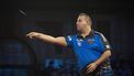 epa10367876 Jermaine Wattimena of the Netherlands plays against Nathan Rafferty of Northern Ireland  (not pictured) during PDC World Darts Championships at Alexandra Palace in London, Britain, 15 December 2022.  EPA/TOLGA AKMEN