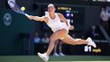 Ukraine's Marta Kostyuk returns to Italy's Jasmine Paolini during their women's singles quarter-final tennis match on the tenth day of the 2026 Wimbledon Championships at The All England Lawn Tennis and Croquet Club in Wimbledon, southwest London, on July 8, 2026. 
HENRY NICHOLLS / AFP