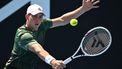 Netherlands' Tallon Griekspoor hits a return against Poland's Hubert Hurkacz during their men's singles match on day three of the Australian Open tennis tournament in Melbourne on January 14, 2025. 
Paul Crock / AFP