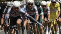 Alpecin - Deceuninck team's Dutch rider Mathieu van der Poel wearing the overall leader's yellow jersey (R) cycles with Alpecin - Deceuninck team's Belgian rider Jasper Philipsen wearing the best sprinter's green jersey (3rd R) and teammates during the 3rd stage of the 112th edition of the Tour de France cycling race, 178.3 km between Valenciennes and Dunkerque (Dunkirk), Northern France, on July 7, 2025. 
Marco BERTORELLO / AFP