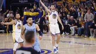 epa12034178 Golden State Warriors center Quinten Post (R) reacts after shooting a three point basket against the Memphis Grizzlies during the first half of the NBA Play-In Tournament game between the Memphis Grizzlies and the Golden State Warriors in San Francisco, California, USA, 15 April 2025. The winner will earn the NBA Western Conference 7 seed.  EPA/JOHN G. MABANGLO  SHUTTERSTOCK OUT