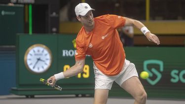 2023-09-17 14:58:16 epa10866238 Botic Van de Zandschulp of Netherlands in action against Duje Ajdukovic of Croatia during the Davis Cup Group D match between Netherlands and Croatia in Split, Croatia, 17 September 2023.  EPA/STRINGER