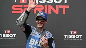 BK8 Gresini Racing MotoGP team's Spanish MotoGP rider Alex Marquez waves as he celebrates coming second place in the Sprint race in the MotoGP Malaysian Grand Prix at the Sepang International Circuit in Sepang on October 25, 2025. 
Lillian SUWANRUMPHA / AFP