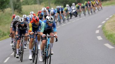 The pack rides during the fifth stage of the 76th edition of the Criterium du Dauphine cycling race, 167km between Amplepuis and Saint-Priest, central France, on June 6, 2024. 
Thomas SAMSON / AFP