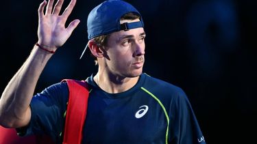 Australia's Alex de Minaur waves after being defeated by Italy's Jannik Sinner during their match at the ATP Finals tennis tournament in Turin on November 10, 2024. 
Marco BERTORELLO / AFP