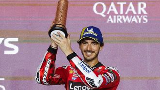 Third-placed Aprilia Racing's Spanish rider Jorge Martin celebrates on the podium at the end of the Qatar MotoGP Grand Prix at the Lusail International Circuit in Lusail, north of Doha, on April 13, 2025. 
Karim JAAFAR / AFP