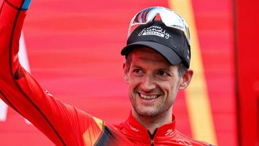 Team Bahrain's Dutch rider Wout Poels celebrate on the podium after winning the stage 20 of the 2023 La Vuelta cycling tour of Spain, a 207,8 km race between Manzanares el Real and Guadarrama, on September 16, 2023. 
Oscar DEL POZO / AFP