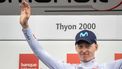 Britain's Max Poole celebrates on the podium wearing the white jersey of the best young rider after the fourth stage of the Tour de Romandie UCI cycling World tour, 161,6 km from Sion to Thyon, on April 29, 2023. 
Fabrice COFFRINI / AFP
