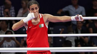 epa11522743 Imane Khelif of Algeria (red) celebrates winning over Anna Luca Hamori of Hungary (blue) in their Women 66kg Quarterfinal bout of the Boxing competitions in the Paris 2024 Olympic Games, at the North Paris Arena in Villepinte, France, 03 August 2024.  EPA/ALI HAIDER