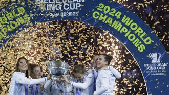 epa11731690 Players of Italy celebrate with the trophy after winning against Slovakia in the final of the Billie Jean King Cup, in Malaga, Spain, 20 November 2024.  EPA/JORGE ZAPATA