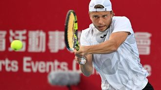 France's Alexandre Muller hits a return to Japan's Kei Nishikori during their men's singles final match at the Hong Kong Open tennis tournament in Hong Kong on January 5, 2025. 
Peter PARKS / AFP