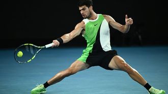 epa12684495 Carlos Alcaraz of Spain in action during his Men's Singles quarter-finals match against Alex de Minaur of Australia at the Australian Open tennnis tournament in Melbourne, 27 January 2026.  EPA/JOEL CARRETT  AUSTRALIA AND NEW ZEALAND OUT