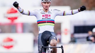 Dutch rider Mathieu Van Der Poel celebrates as he crosses the finish line to win the Men's UCI Cyclocross World Cup elite race in Gavere, northern Belgium, on December 26, 2024. 
JASPER JACOBS / Belga / AFP