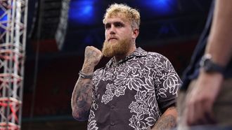 US boxer Jake Paul attends Ukraine's Oleksandr Usyk and Britain's Daniel Dubois's undisputed world heavyweight boxing title bout at Wembley Stadium in London on July 19, 2025. 
Adrian Dennis / AFP