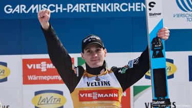 epa12620839 Winner Domen Prevc of Slovenia celebrates on the podium at the Men's Large Hill HS137 competition of the second stage of the 74th Four Hills Tournament, in Garmisch-Partenkirchen, Germany, 01 January 2026.  EPA/ANNA SZILAGYI