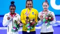 2023-10-07 15:48:49 (From L) Second-placed US' Simone Biles, winner Brasil's Rebeca Andrade and third-placed Korea's Seojeong Yeo celebrate on the podium after the Women's Vault Final during the 52nd FIG Artistic Gymnastics World Championships, in Antwerp, northern Belgium, on October 7, 2023. 
KENZO TRIBOUILLARD / AFP